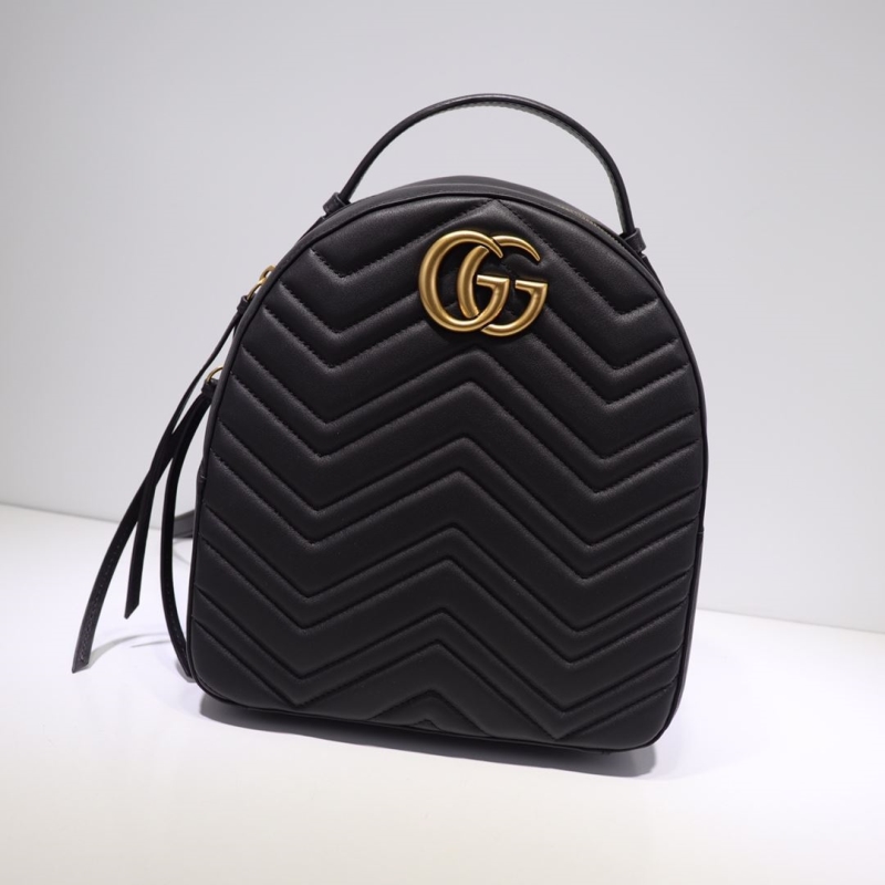 G*u*i top handle bags